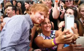  ?? Photograph: Ryan Pierse/Getty Images ?? ‘He reached the peak just through hard work, which inspires me a lot’ … Ed Sheeran pictured with fans in Sydney, Australia, 2015.