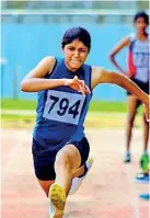  ??  ?? Dushanthi Navaratne of Kelaniya University, winner of the women’s Triple Jump event, in action