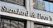  ?? PHOTO: EPA ?? S&P Global downgraded SA to junk status.