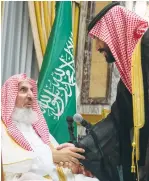  ?? (Reuters) ?? SAUDI ARABIA’S Crown Prince Mohammed bin Salman (right) shakes hands with Grand Mufti Abdulaziz Al al-Sheikh during a pledge of allegiance in Mecca on June 21.