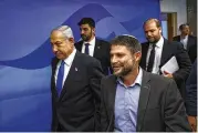  ?? AP FILE ?? Israeli Prime Minister Benjamin Netanyahu (left) and Finance Minister Bezalel Smotrich arrive at the Prime Minister’s office in Jerusalem, on Feb. 23.