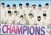  ?? AFP ?? ■ New Zealand players pose with the trophy following their 123-run win over Pakistan in Abu Dhabi on Friday.