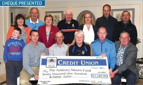  ?? Photo by Michelle Cooper Galvin ?? Pat O’Connor, Johnny Shanahan Valentia GAA (seated left) presenting €7,180 from the Charity Cycle for The Anthony Morris Fund to Gerard Mangan Chairman Spa GAA Club, Jim Morris and Jim Morris senior. Back (from left): Satanta Cronin, Cllr Mick Gleeson,...