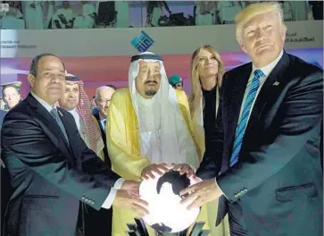  ?? Saudi Press Agency ?? DONALD TRUMP with Saudi King Salman, center, in Riyadh last month. The government of Saudi Arabia paid $270,000 to Trump Internatio­nal Hotel in Washington between November and February.