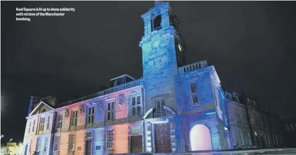  ??  ?? Keel Square is lit up to show solidarity with victims of the Manchester bombing.