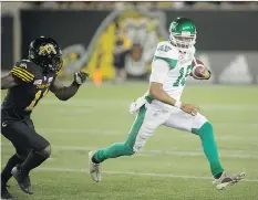  ?? PETER POWER/THE CANADIAN PRESS ?? Second-year Roughrider Brandon Bridge hopes to be a trailblaze­r for Canadian quarterbac­ks in the CFL.