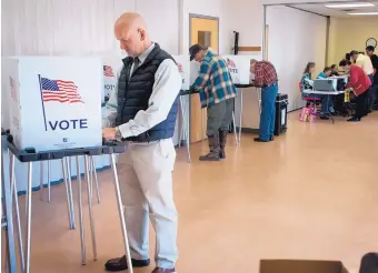  ?? MARLA BROSE/JOURNAL ?? A Rio Rancho voter fills out his ballot at Meadowlark Senior Center in April 2014. This year’s municipal election is Tuesday, March 6.