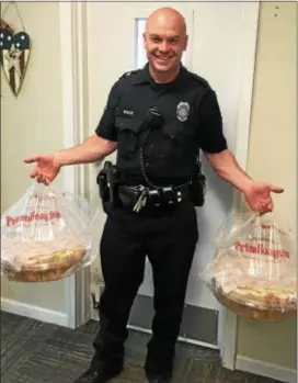  ??  ?? Maria Hunt, owner of Primo Hoagies in Aston dropped off Aston Police Department for National Hoagie Day. hoagies to