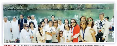  ??  ?? BAPTISMAL SITE. The Cebu pilgrims at Yardenit by the River Jordan after the reenactmen­t of Baptism officiated by Fr. Joseph Yntig (third from left).