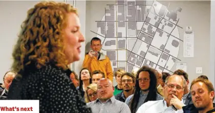  ?? STAFF PHOTO BY C.B. SCHMELTER ?? A map of the Innovation District is seen on the wall as Director of Innovation District Programs Mary Stargel speaks during a public meeting on the framework for the Innovation District at the Edney Innovation Center on Tuesday.