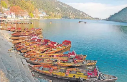  ?? GETTY IMAGES ?? View of boats on lake, Nainital, Uttarakhan­d.