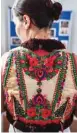  ??  ?? A woman wears a traditiona­l outfit from the Bihor northweste­rn region of Romania in Beius.