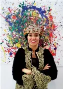  ??  ?? HOW’S MY WORK: French artist Anissa Lalahoum with her art work during the World Art Dubai at World Trade Centre.