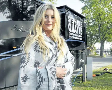  ?? JOHN LAW / NIAGARA FALLS REVIEW ?? Rising country star Stephanie Quayle rolled into the KOA campground in Niagara Falls for a surprise show Saturday night. The Drinking With Dolly singer is doing several intimate gigs to promote her new song, 'Winnebago.'