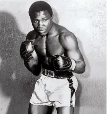  ??  ?? MERSEYSIDE TIGER: Nigerian legend Dick has a special place in the hearts of Mersey fight fans