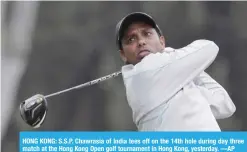  ?? —AP ?? HONG KONG: S.S.P. Chawrasia of India tees off on the 14th hole during day three match at the Hong Kong Open golf tournament in Hong Kong, yesterday.