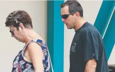  ?? Pictures: LIAM KIDSTON ?? SURVIVOR: Ruben McDornan arrives at Gladstone Police Station with his mum Mardi and (left) the catamaran On the Level, which rescued him, at Gladstone Marina.