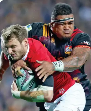 ??  ?? Chiefs prop Siegfried Fisi’ihoi makes a tackle against the British and Irish Lions.
