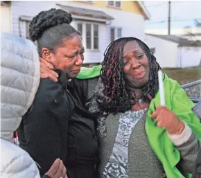  ?? ANGELA PETERSON / MILWAUKEE JOURNAL SENTINEL ?? Brenda Hines, left, and Shannon Allen at a vigil for Hines’ son, Donovan, who was killed Nov. 13, 2017, near West Hampton Avenue and North 29th Street.