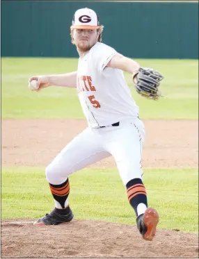  ?? Westside Eagle Observer/MIKE ECKELS ?? Jake Carver delivers a pitch to home plate during the third inning of the Gravette-Shiloh Christian baseball game on April 13 at Lion Ballpark in Gravette. Carver lasted four innings for the Lions, throwing a total of 86 pitches.