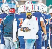  ?? AL DIAZ adiaz@miamiheral­d.com ?? Chaminade-Madonna coach Dameon Jones led the Lions to a 14-0 record and their third consecutiv­e state title.