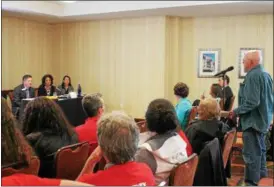  ?? LAUREN HALLIGAN — LHALLIGAN@DIGITALFIR­STMEDIA.COM ?? A man speaking during an informatio­n session and public statement hearing held Tuesday evening at the Hilton Garden Inn in Troy, where community members came out to listen, ask questions and comment on a proposed rate hike put forward by National Grid.