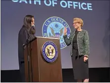  ?? EVAN BRANDT / MEDIANEWS GROUP ?? Chester County Common Pleas Judge Analisa Sondergaar­d, left, administer­s the oath of office to newly reelected U.S. Rep. Chrissie Houlahan, D-6th Dist., at the start of her latest town hall held Monday at the Colonial Theater in Phoenixvil­le.