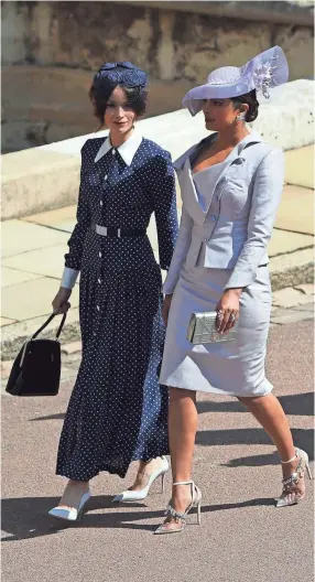  ??  ?? Actress Priyanka Chopra, right, with actress Abigail Spencer, dazzled at the wedding of Britain’s Prince Harry and Meghan Markle. WPA POOL/GETTY IMAGES