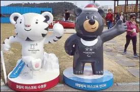  ??  ?? Soohorang, a white tiger and Bandabi, an Asiatic black bear are the official mascots of the 2018 Winter Olympics which will be held in Pyeongchan­g, South Korea from Feb. 9 to 25, 2018.