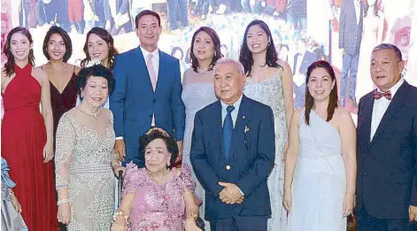  ??  ?? The Ricafort family: (Seated) mother of the celebrant Pinang Saldana, (standing) Gaby Climaco, Sofia Climaco, Michelle Climaco, Manny and Monica Climaco, Bambie Ricafort, (front) Nona and Benny Ricafort, Maricel and Bombie Ricafort