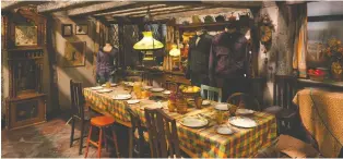  ??  ?? The Weasleys’ cosy kitchen operates mainly on magic, feeding a family of nine witches and wizards.