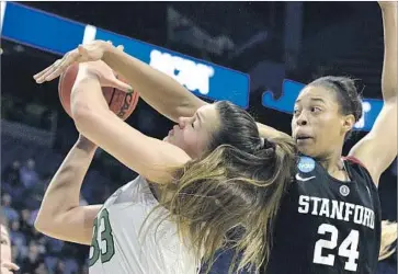  ?? Timothy D. Easley Associated Press ?? ERICA McCALL of Stanford tries to block a shot by Kathryn Westbeld of Notre Dame in the second half.