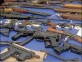  ?? TRENTONIAN FILE PHOTO ?? Trenton police displayed a number of seized illegal guns at a press conference.