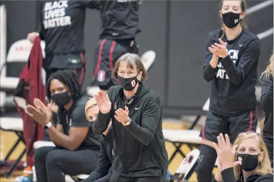  ?? John Todd / ISI Photos / Getty Images ?? Coach Tara Vanderveer of Stanford cheers her players during Tuesday night’s game between the Cardinal and Pacific at Alex G. Spanos Center in Stockton, Calif. Her overall record now stands at 1,099 victories and 253 losses.