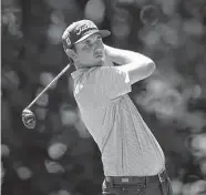  ?? Charlie Neibergall/Associated Press ?? J.T. Poston, teeing off on No. 6, had seven birdies in a bogey-free round at the John Deere Classic.