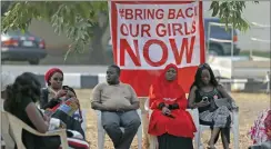  ??  ?? PROTEST: Nigerians take part in a sit-in demonstrat­ion organised by the Abuja “Bring Back Our Girls” protest group. Boko Haram has kidnapped hundreds of people during its campaign to carve out an Islamic caliphate in north-east Nigeria.