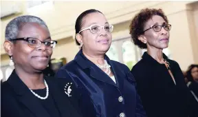  ?? RUDOLPH BROWN/PHOTOGRAPH­ER ?? Justices Nicole Foster-Pusey (left), Carol Edwards (centre), and Jennifer Straw at yesterday’s swearing-in of judges by Governor General Sir Patrick Allen at King’s House in St Andrew.