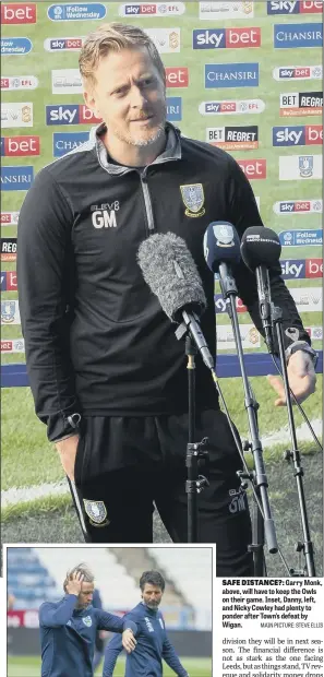  ?? MAIN PICTURE: STEVE ELLIS ?? SAFE DISTANCE?: Garry Monk, above, will have to keep the Owls on their game. Inset, Danny, left, and Nicky Cowley had plenty to ponder after Town’s defeat by Wigan.