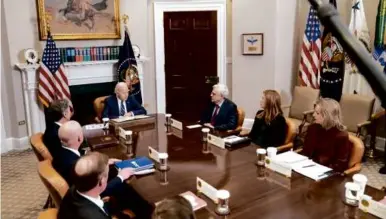  ?? EVAN VUCCI/ASSOCIATED PRESS ?? DRUG FIGHT — President Biden spoke with officials during a White House meeting on combating fentanyl on Tuesday. Biden pressed lawmakers to approve more funding and tighten laws to help block fentanyl traffickin­g.