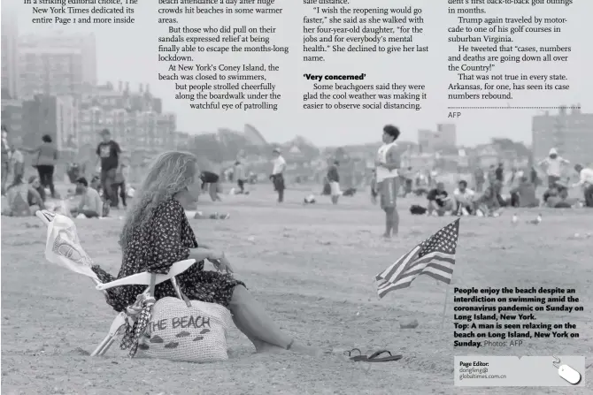  ?? Photos: AFP ?? People enjoy the beach despite an interdicti­on on swimming amid the coronaviru­s pandemic on Sunday on Long Island, New York.
Top: A man is seen relaxing on the beach on Long Island, New York on Sunday.