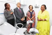  ?? - Pictures: John Manzongo ?? Batswana First Lady Mrs Neo Jane Masisi and First Lady Dr Auxillia Mnangagwa share a lighter moment with doctors in the gynaecolog­y unit of her mobile hospital at State House in Harare on Wednesday.