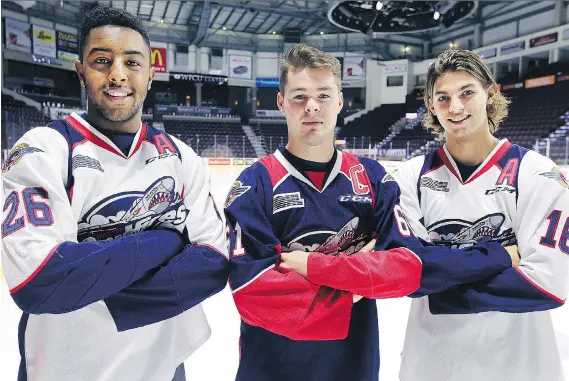  ?? DAN JANISSE ?? Windsor Spitfires captain Luke Boka, middle, is joined by alternate captains Cole Purboo, left, and Chris Playfair on Wednesday at the WFCU Centre.