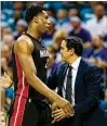  ?? GETTY IMAGES ?? Heat coach Erik Spoelstra and center Hassan Whiteside might have some fence-mending to do in light of Whiteside’s latest jab.