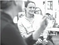  ?? Associated Press ?? n Tech fellow Ben Guhin looks on during a meeting to discuss improvemen­ts in a program in Austin.