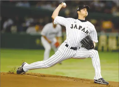  ?? The Associated Press ?? Major League Baseball owners approved a new posting agreement with their Japanese counterpar­ts on Friday in a move that allows bidding to start for coveted pitcher and outfielder Shohei Ohtani, one of the top free agents available this year.