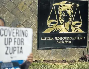  ?? Picture: Gallo Images/Alet Pretorius ?? A protester pickets outside the NPA offices in Pretoria in 2017.