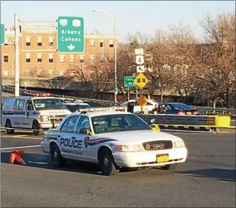  ?? FILE PHOTO ?? Troy police investigat­e an officer-involved shooting at the entrance to the Collar City Bridge that left a Watervliet man dead.