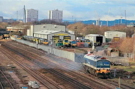  ??  ?? ‘59s’ VISIT LEEDS DEPOT: Having spent Christmas and the New Year at Freightlin­er’s Leeds Midland Road depot, No. 59104 returned to Somerset on January 3, working a ‘billy no mates’ 0F59/12.31 to Merehead, which is pictured leaving the depot. This left No. 59103 still in Leeds, while No. 59206 made a flying visit to the West Yorkshire depot for tyre turning, arriving on January 23 and leaving then next day. Chris Gee