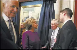  ?? CHASE STEVENS LAS VEGAS REVIEW-JOURNAL ?? Vice President Joe Biden, from left, former Secretary of State Hillary Clinton, Senate Minority Leader Harry Reid, D-Nev., and artist Gavin Glakas are seen during a ceremony to unveil a portrait of Reid on Capitol Hill on Dec. 8.