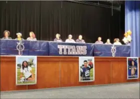  ?? FUAD SHALHOUT — THE MORNING JOURNAL ?? From left, Seven Townsel, Justin Sturgill and Jazmeir Prayear at the signing ceremony at Lorain High School on April 19.